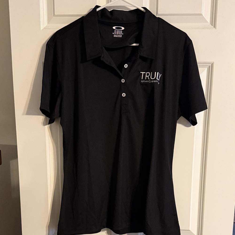 Oakley Black Performance Polo with Truly Logo